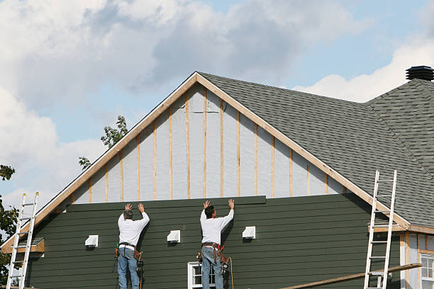 Professional Storm Damage Siding Repair technician working in Christiana, PA
